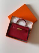 Hermès Mini Kelly 19 bag in Rouge Vif Courchevel Leather