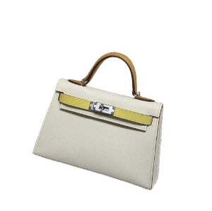 Hermes Kelly top-handle bag in ivory and yellow